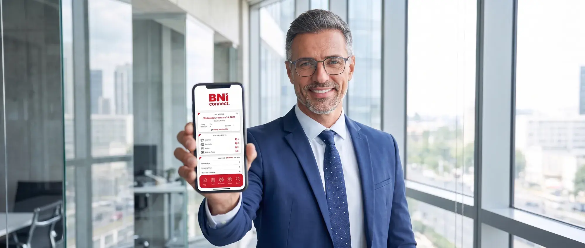 A BNI Member shows the BNI Connect app on a phone