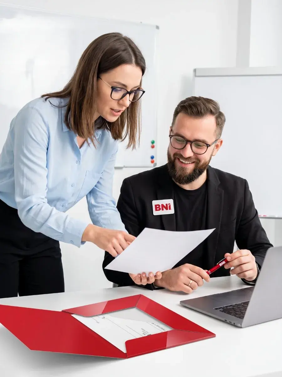 Two people from the BNI Polska team at work