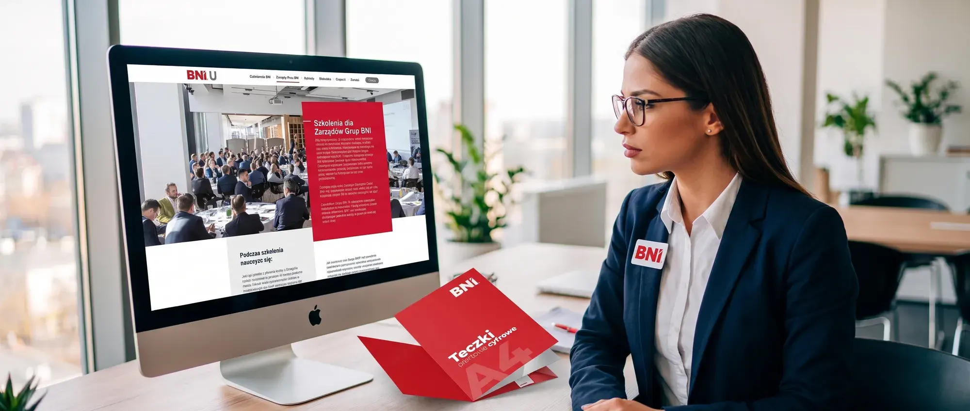 A BNI Member browses BNI University training on a computer screen